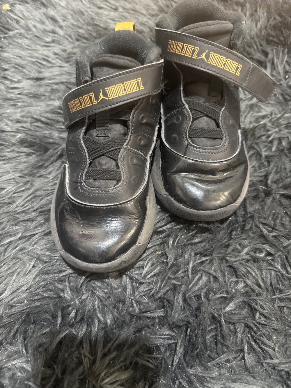 Jordan Kids Black Sneakers with Gold Detail
